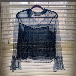 Beautiful transparent dark aqua blue blouse.